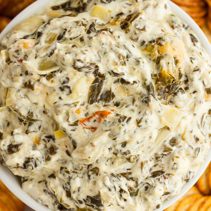 Crockpot Spinach Artichoke Dip is creamy and delicious for the perfect dip for parties, Game Day and more. The crockpot makes it easy to enjoy anytime.