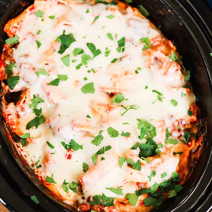 Slow Cooker Sausage Lasagna is a one pot dinner layered with meat, cheese, pasta and the best tomato sauce. Crockpot lasagna with broken noodles is so easy! 