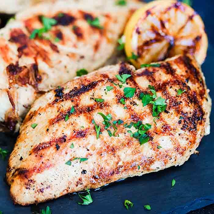 Jazz up plain chicken with this tasty Grilled Lemon Pepper Chicken Recipe. The chicken is so tender and the marinade is light and delicious.