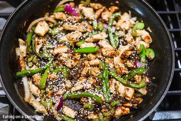 Close up image of black pepper chicken in a skillet. 