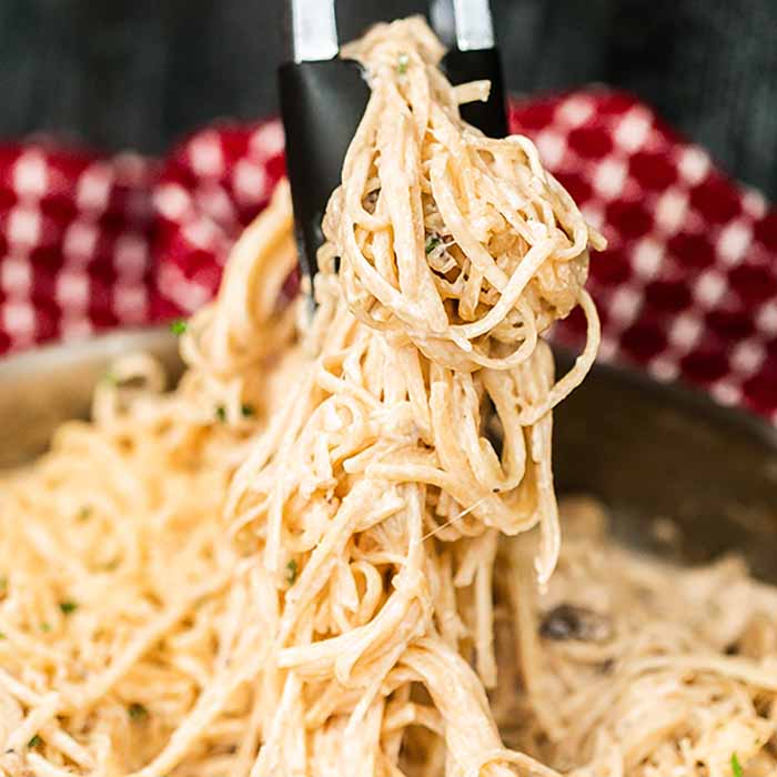 Easy Chicken Tetrazzini Recipe is a simple skillet meal perfect for weeknights. The tasty cream sauce brings it all together and makes the dish amazing!
