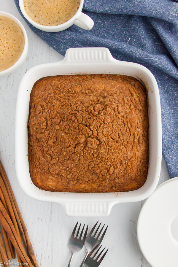 This Easy coffee cake recipe will be a hit at breakfast, weekend brunch or your next gathering. It is simple and delicious with the best cinnamon streusel topping. Add a cup of coffee and you are set for a simple but tasty breakfast! Everyone will love the moist and classic cake with the cinnamon crumb on top. #eatingonadime #coffeecakerecipes #cinnamon