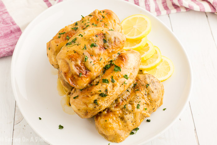 Instant Pot lemon chicken recipe gets dinner on the table in 30 minutes or less! The creamy sauce is so light and perfect to enjoy year round.