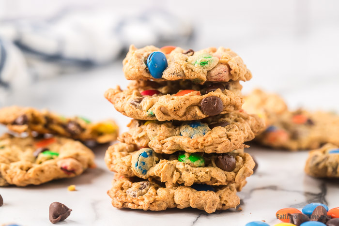 Close up image of a stack of monster cookies. 