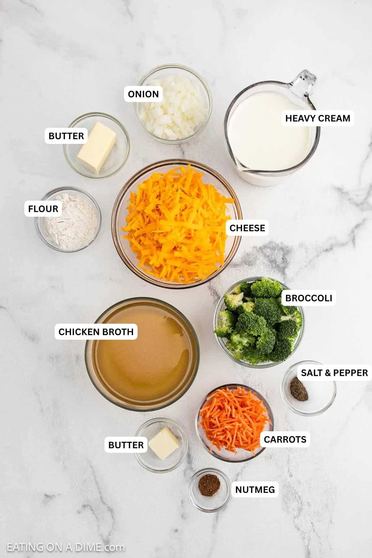 Ingredients for recipe: heavy cream, onion, butter, flour, cheese, broccoli, chicken broth, carrots, butter and nutmeg.