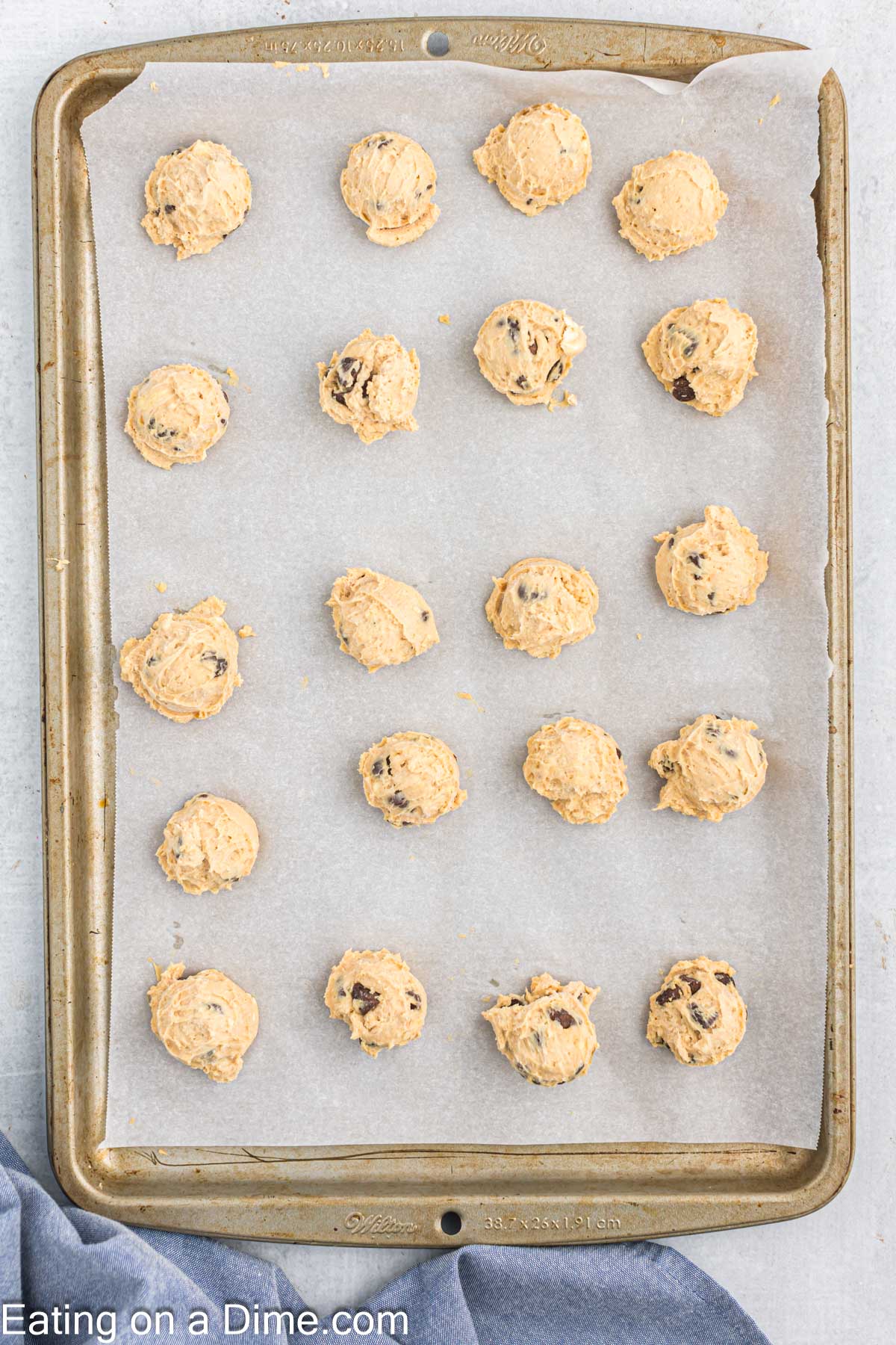 Cookie dough balls placed on the cookie sheet