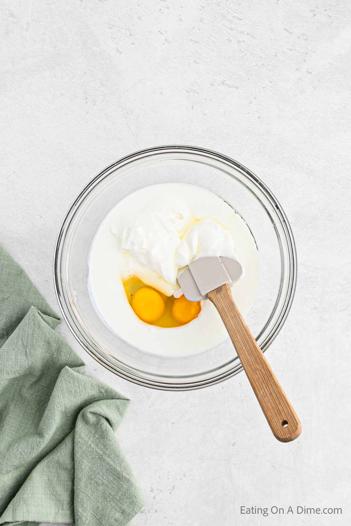 Mix together eggs, buttermilk, sour cream