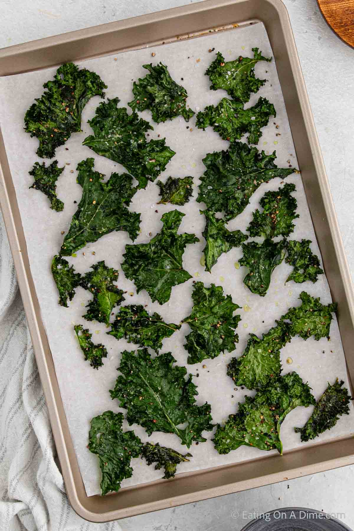 Baked Kale Chips on a baking sheet