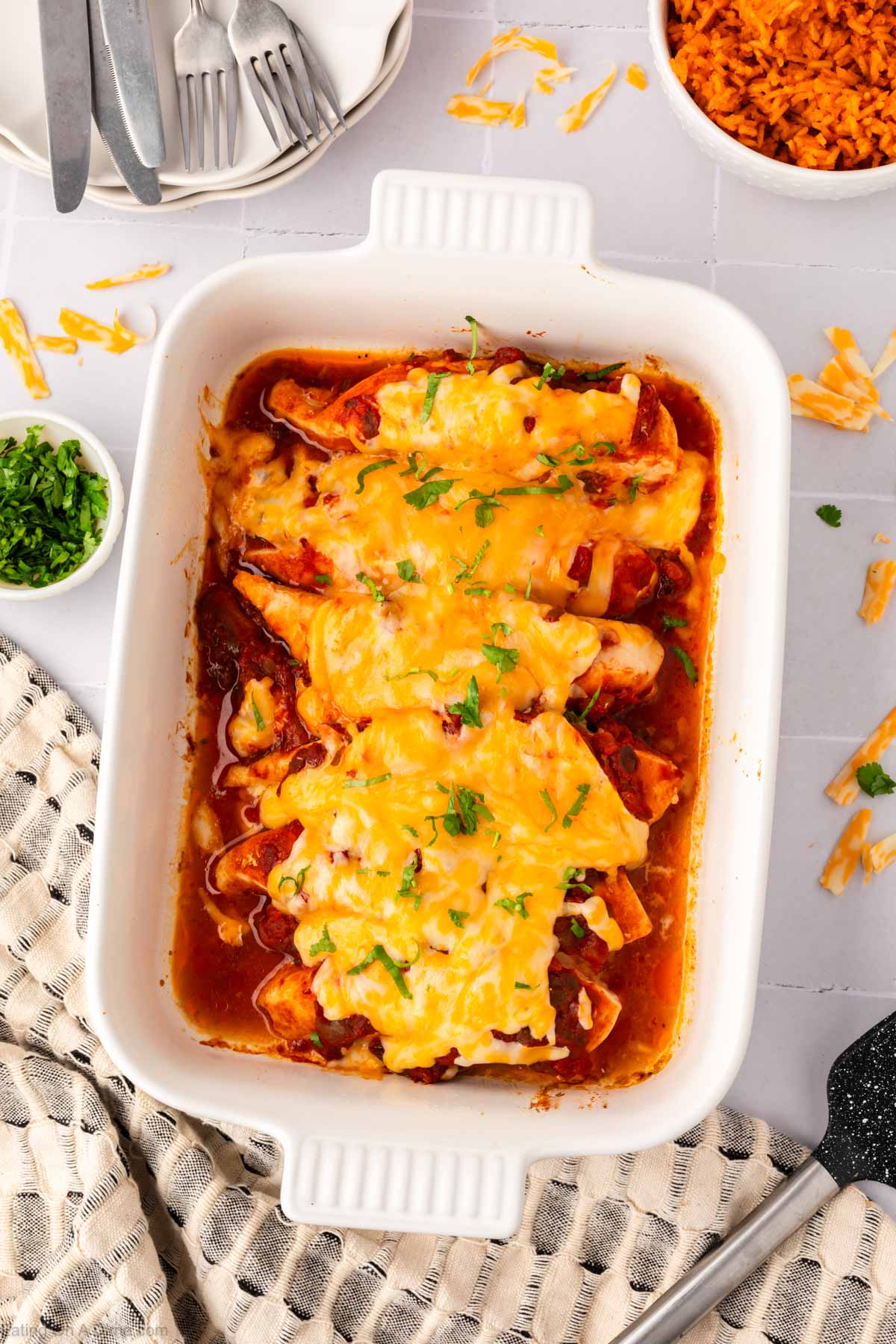 Salsa Baked Chicken in a baking dish topped with cheese