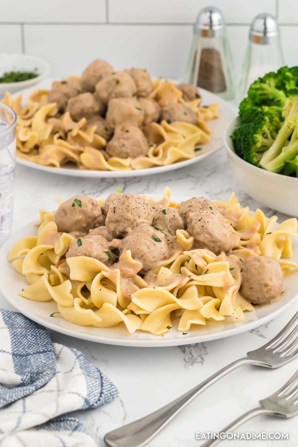 A plate of swedish meatballs over egg noodles