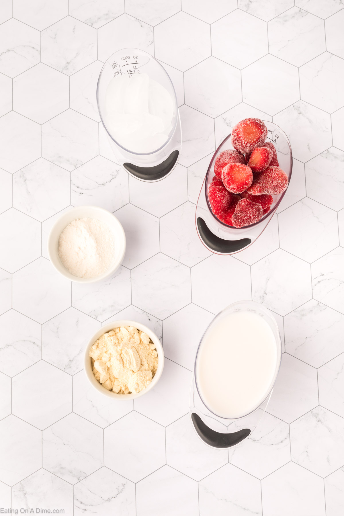Strawberry Protein Shake Ingredients - almond milk, protein powder, strawberries, Jell-O Cheesecake Mix, Ice