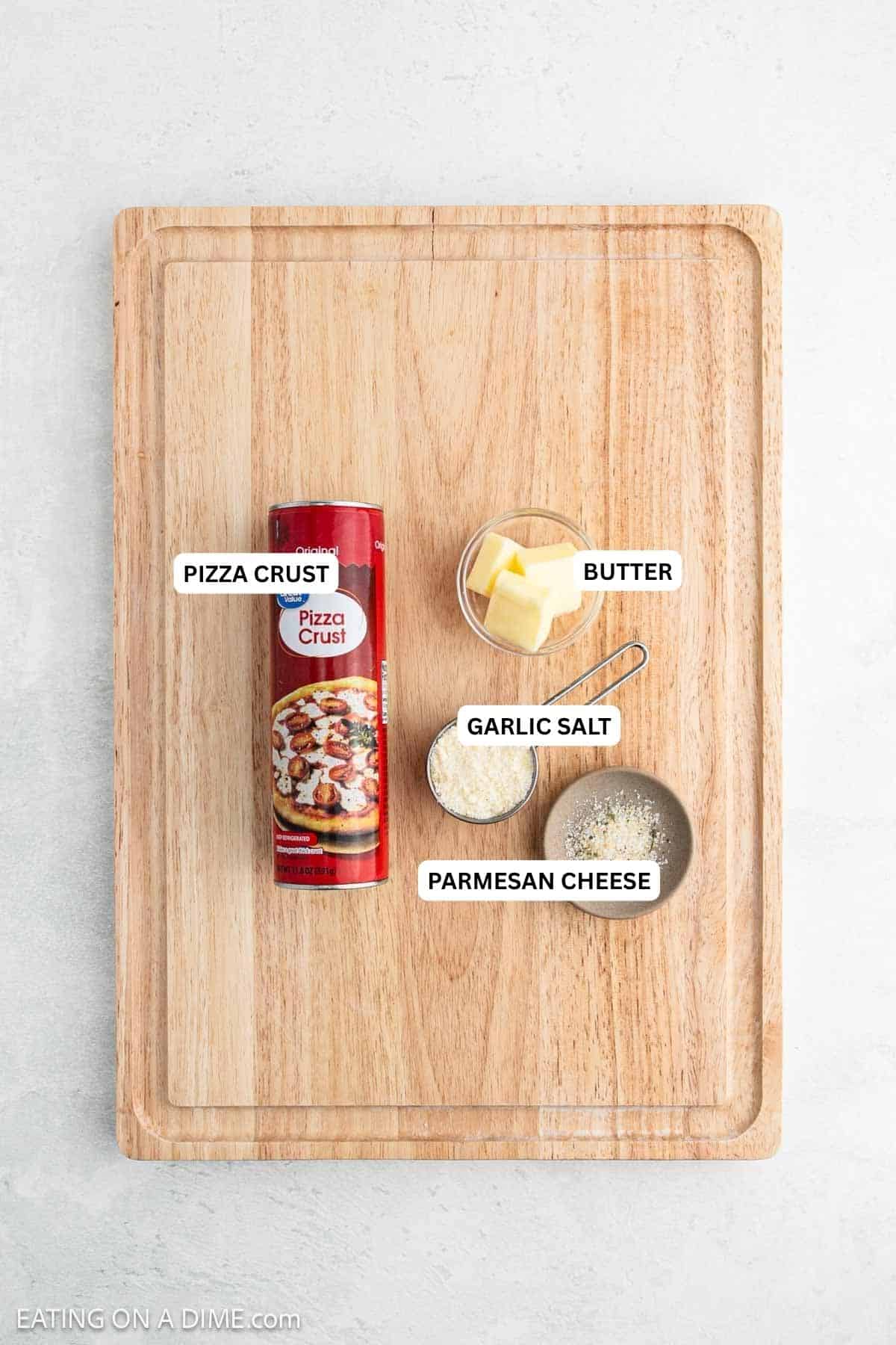 Ingredients for recipe: pizza crust, butter, garlic salt and parmesan cheese.
