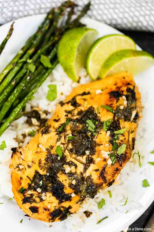 Mojo Chicken Recipe is a delicious citrus infused recipe served over rice with your favorite vegetable. The slow cooker makes this meal effortless.