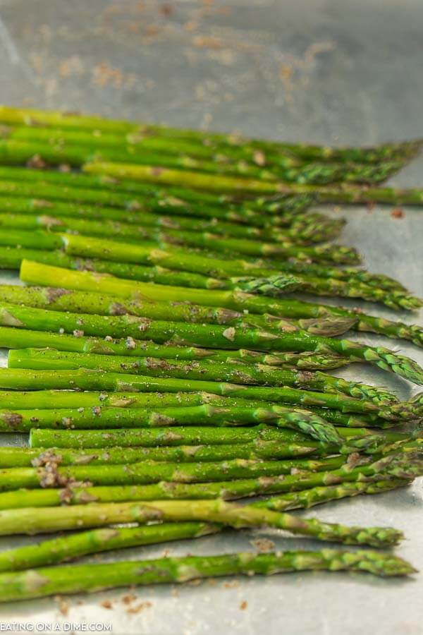 Cooked asparagus on a sheet pan 