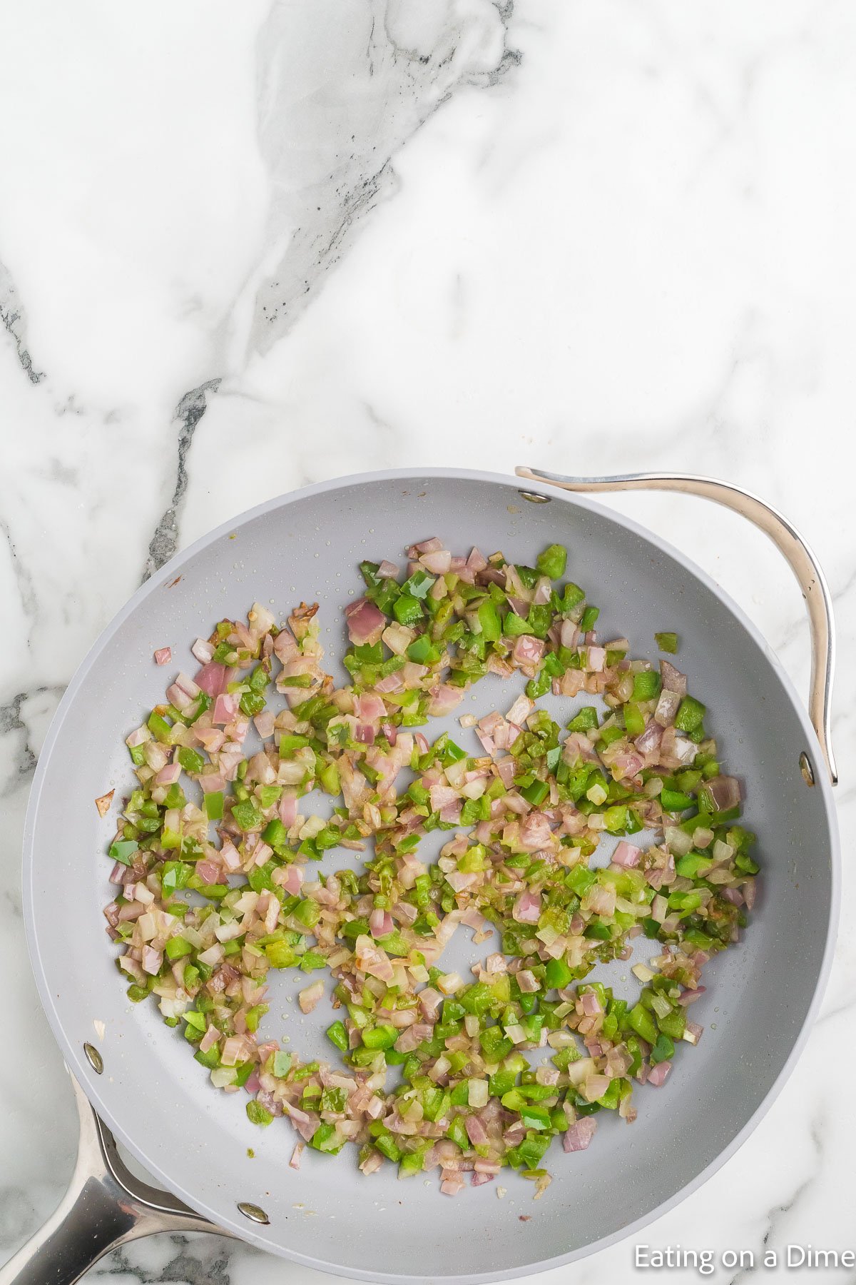 Cooking the veggies in the skillet in bacon grease