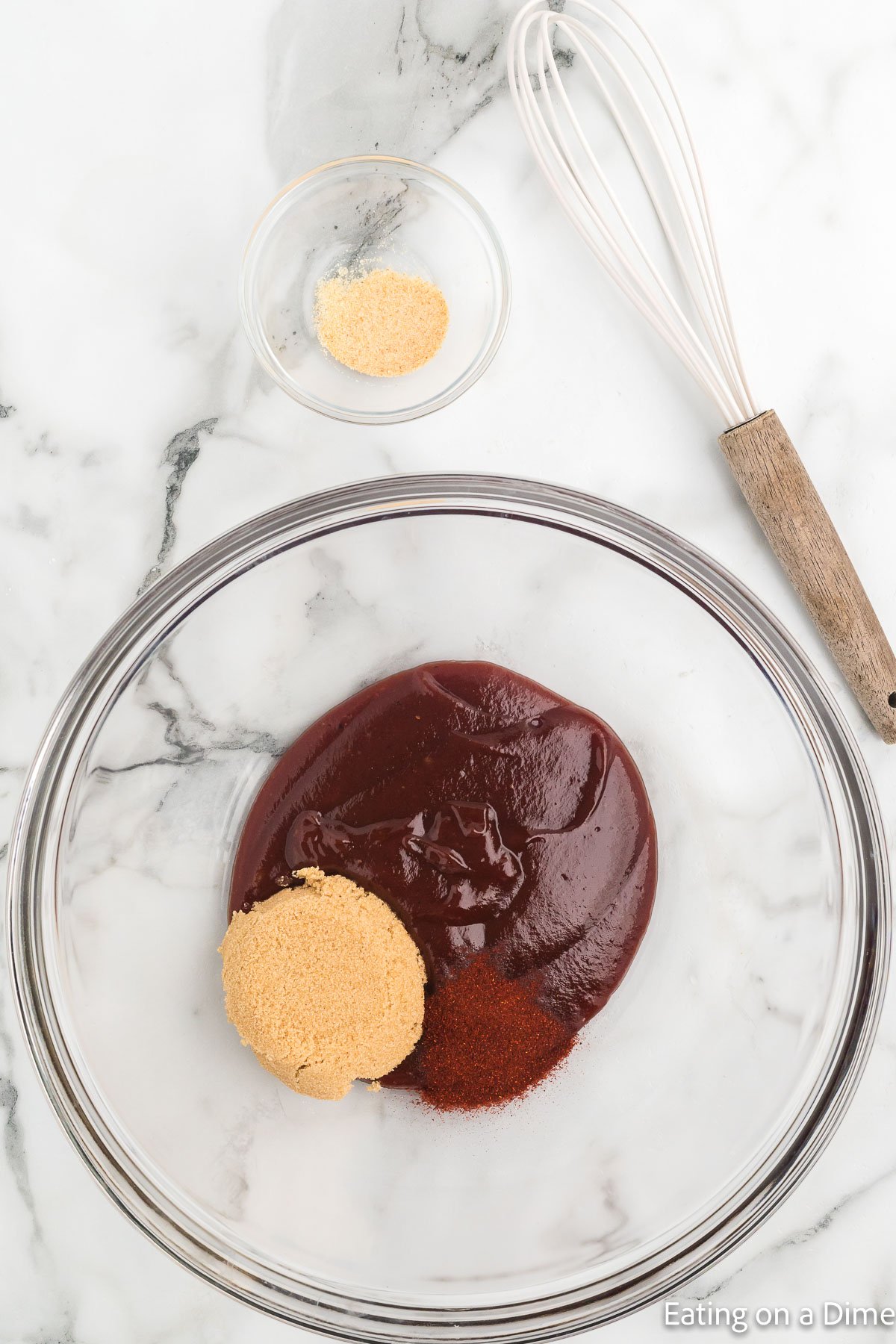 Combining the sauce and seasoning together in a bowl