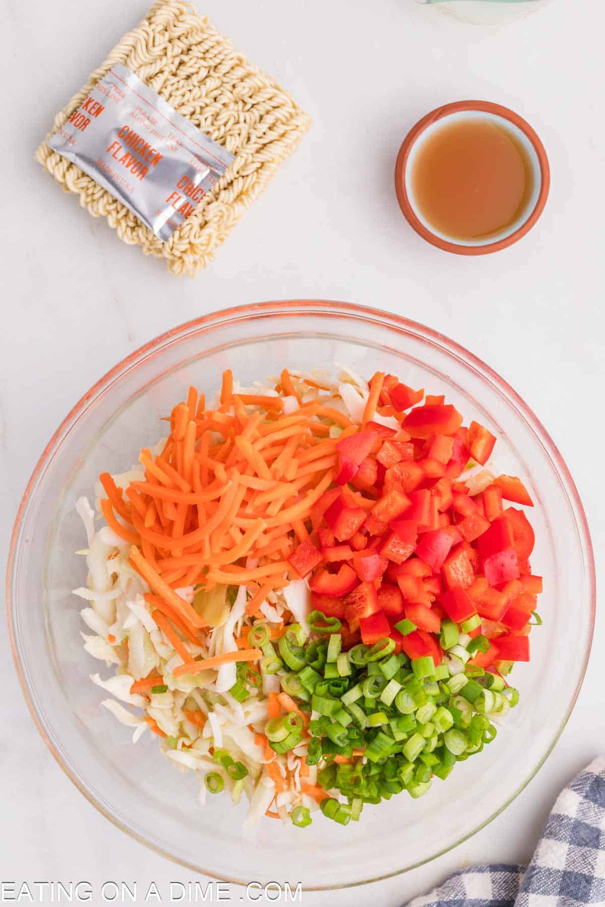 Combining the vegetables in a bowl 