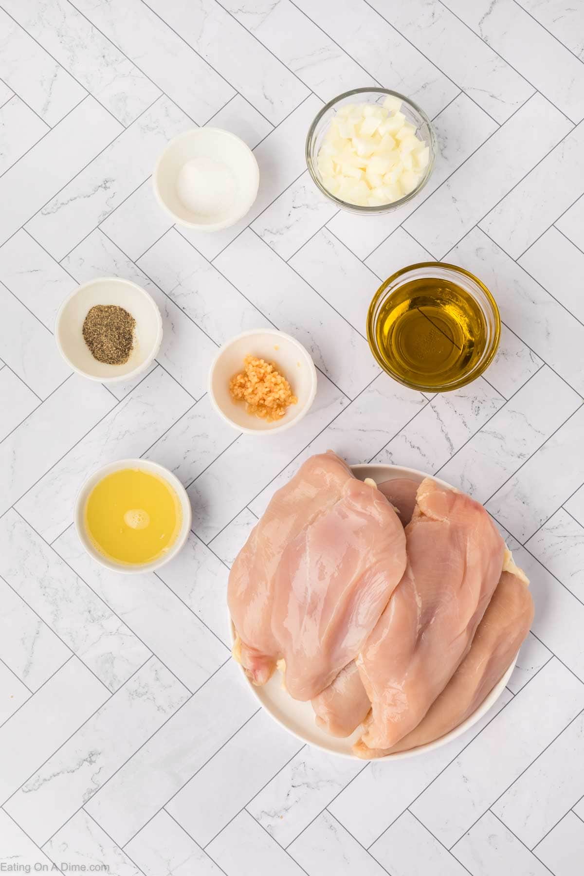 Lemon Chicken ingredients - chicken breast, olive oil, garlic, onion, pepper, salt, lemons