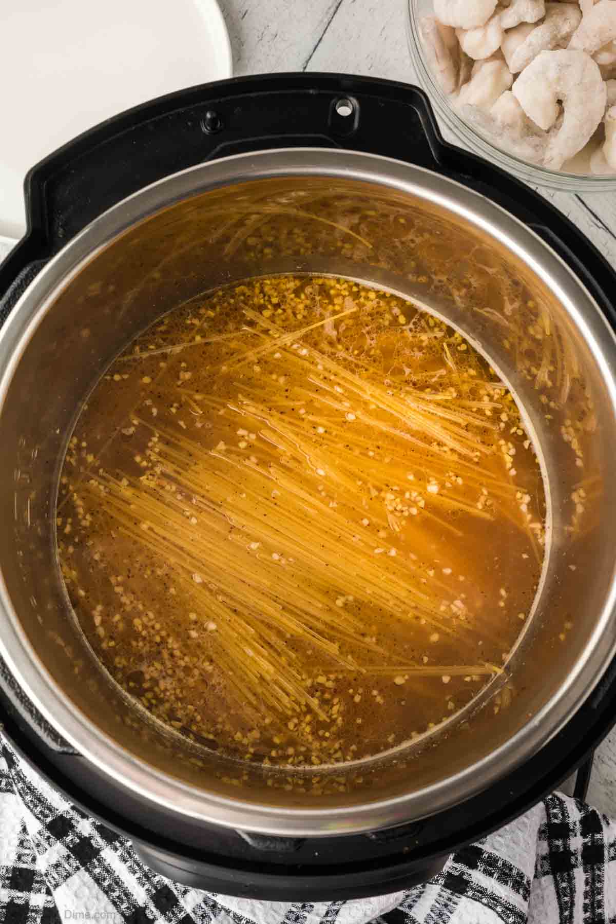 Mixing in the pasta to the instant pot