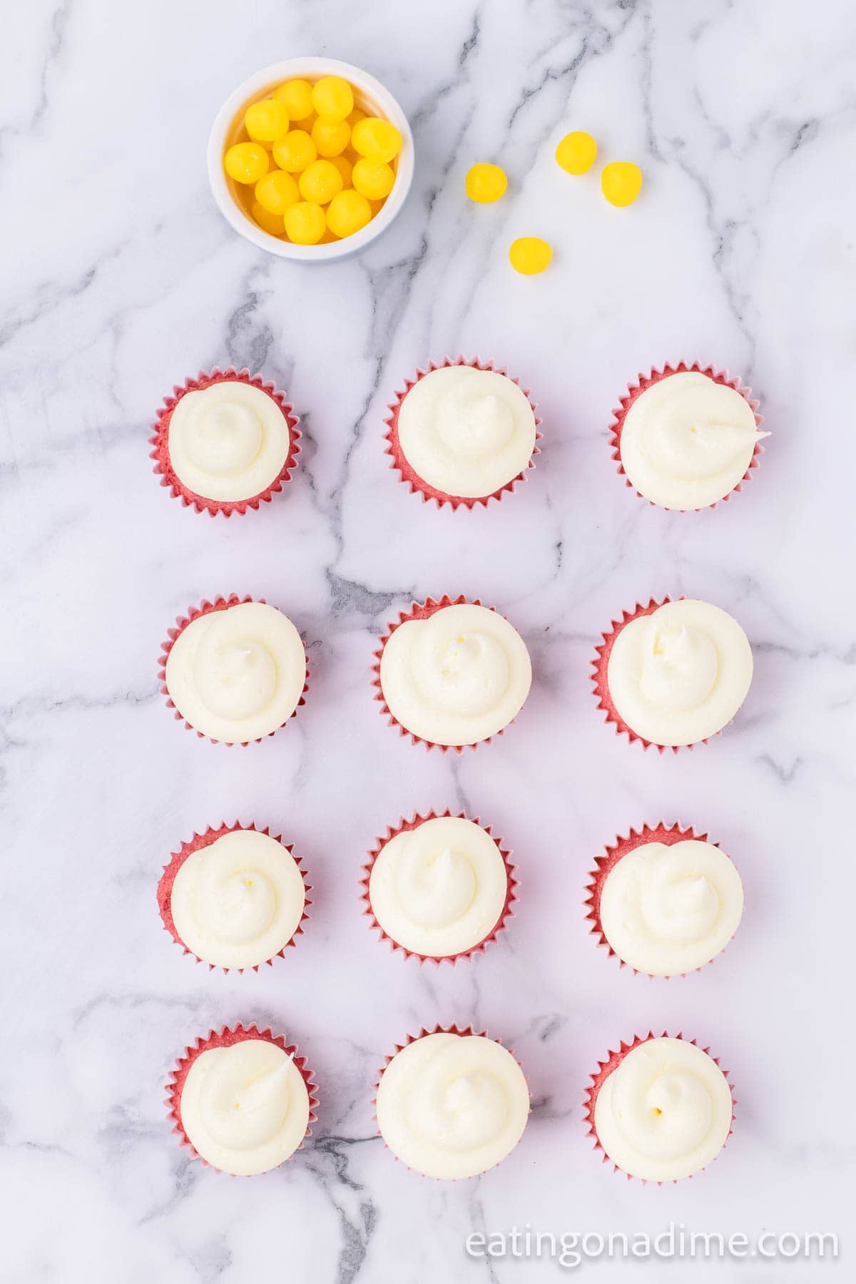Frost the cupcakes with a piping bag to create a swirl motion