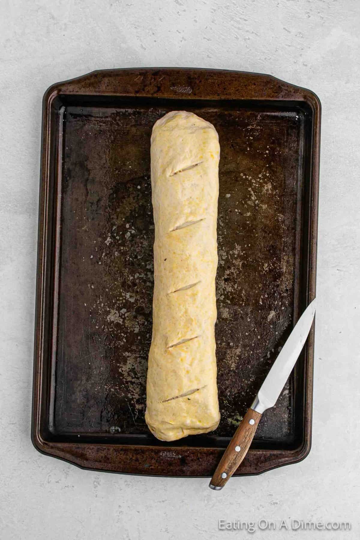 Cutting slices into the stromboli