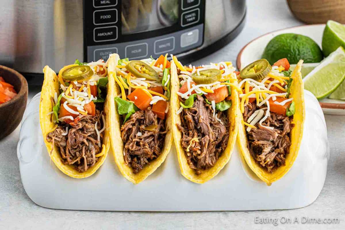 Shredded Beef Tacos on a taco stand