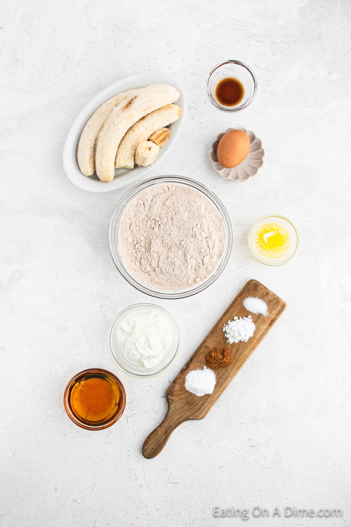 Ingredients - Ripe Bananas, egg, maple syrup, Greek Yogurt, vanilla Extract, butter, flour, baking soda, baking powder, cinnamon salt