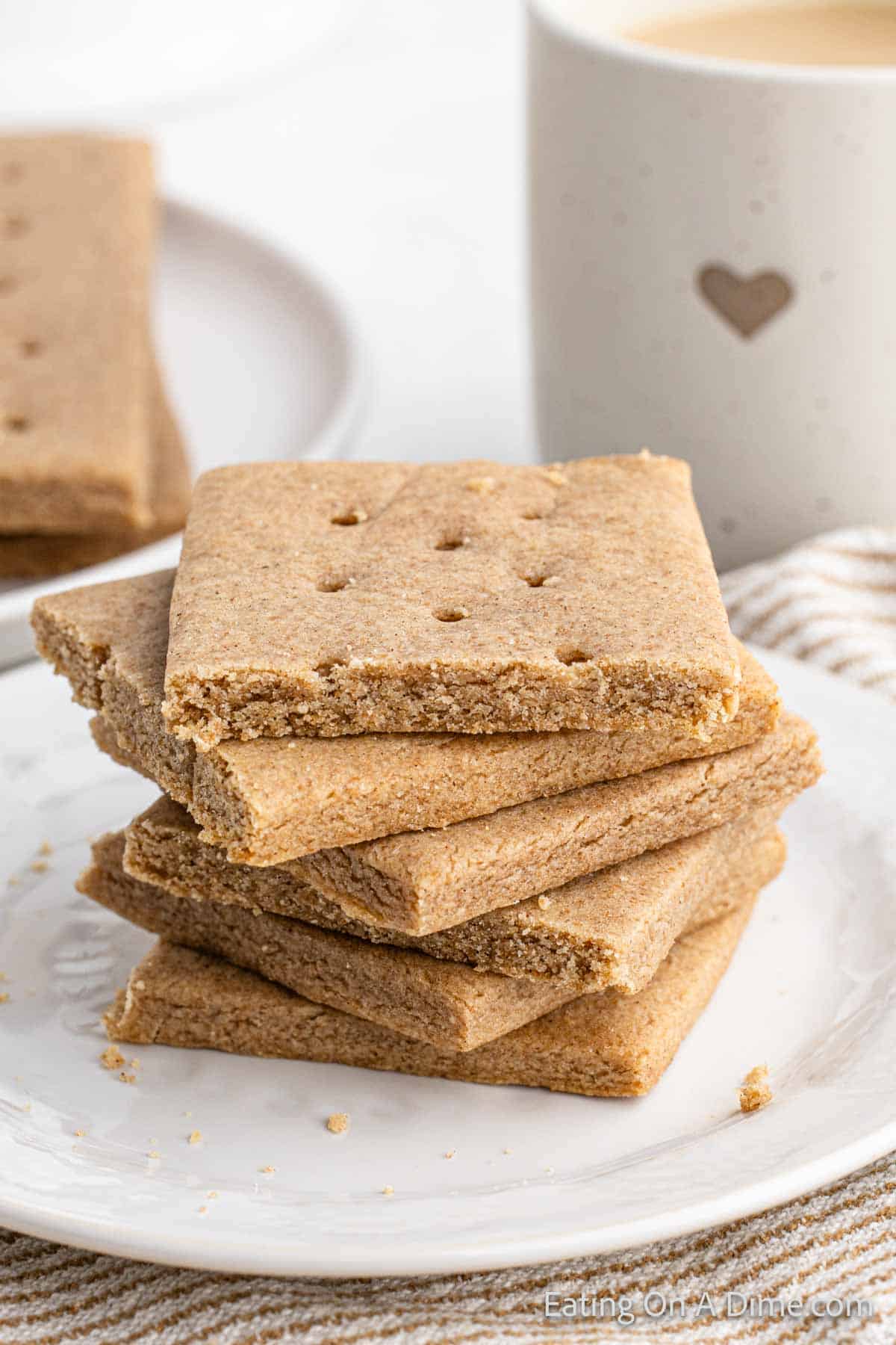 Homemade Graham Crackers stacked on a plate