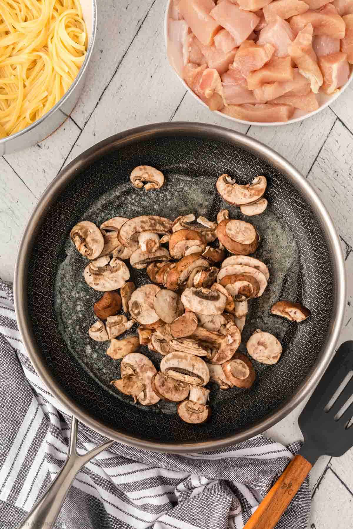 Cooking the slice mushrooms in a skillet