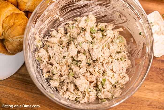 Close up image of chicken salad mixed in a bowl. 
