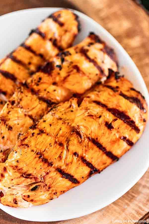 We love to grill and this grilled buffalo chicken recipe is so easy but really packs a ton of buffalo flavor.  Each bite is tender and delicious.