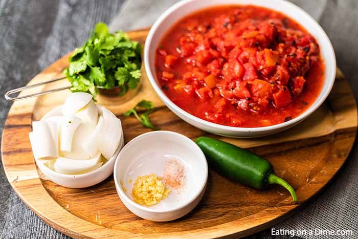 Homemade Salsa Recipe is so easy that you will not believe it.  Make this in minutes and enjoy the best salsa and chips at home. Yum!