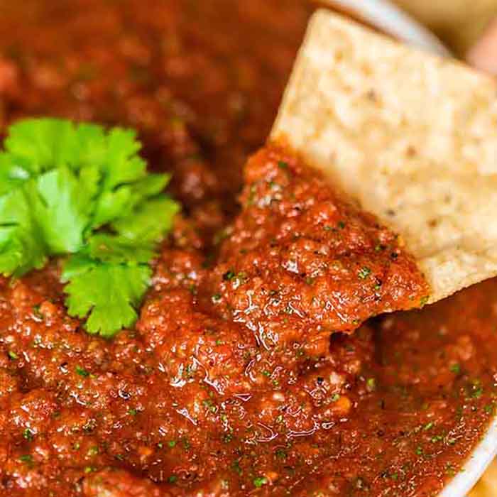 Homemade Salsa Recipe is so easy that you will not believe it.  Make this in minutes and enjoy the best salsa and chips at home. Yum!