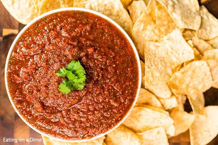 Homemade Salsa Recipe is so easy that you will not believe it.  Make this in minutes and enjoy the best salsa and chips at home. Yum!