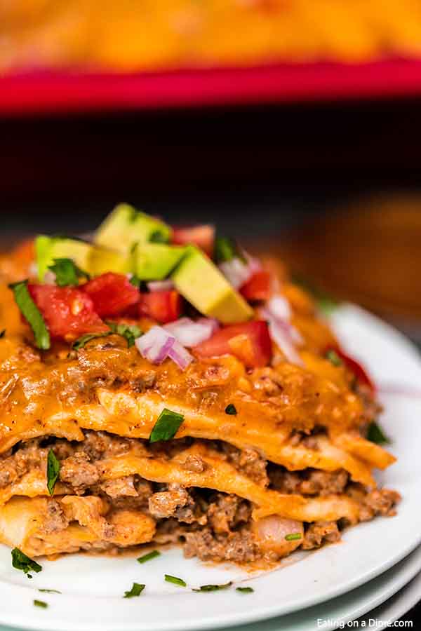 Enjoy Taco Lasagna Recipe any night of the week for dinner full of cheesy and delicious layers. Lots of ground beef, salsa and more blend for a great meal.