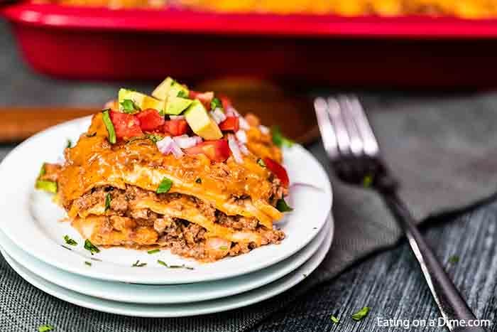 Enjoy Taco Lasagna Recipe any night of the week for dinner full of cheesy and delicious layers. Lots of ground beef, salsa and more blend for a great meal.