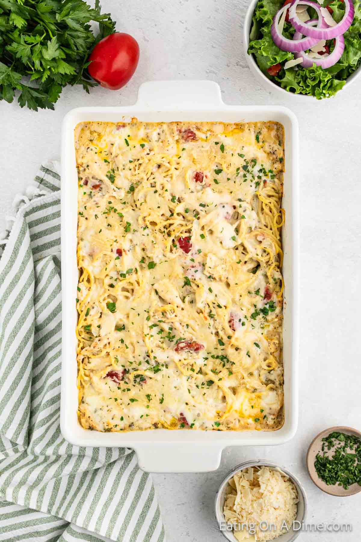 Baked chicken spaghetti casserole in a baking dish