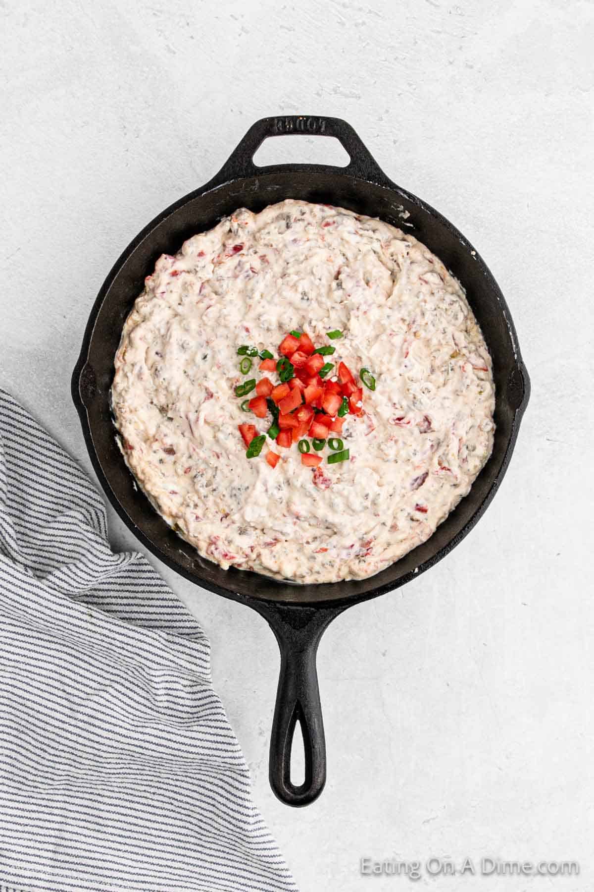 Combined sausage dip in cast iron skillet 