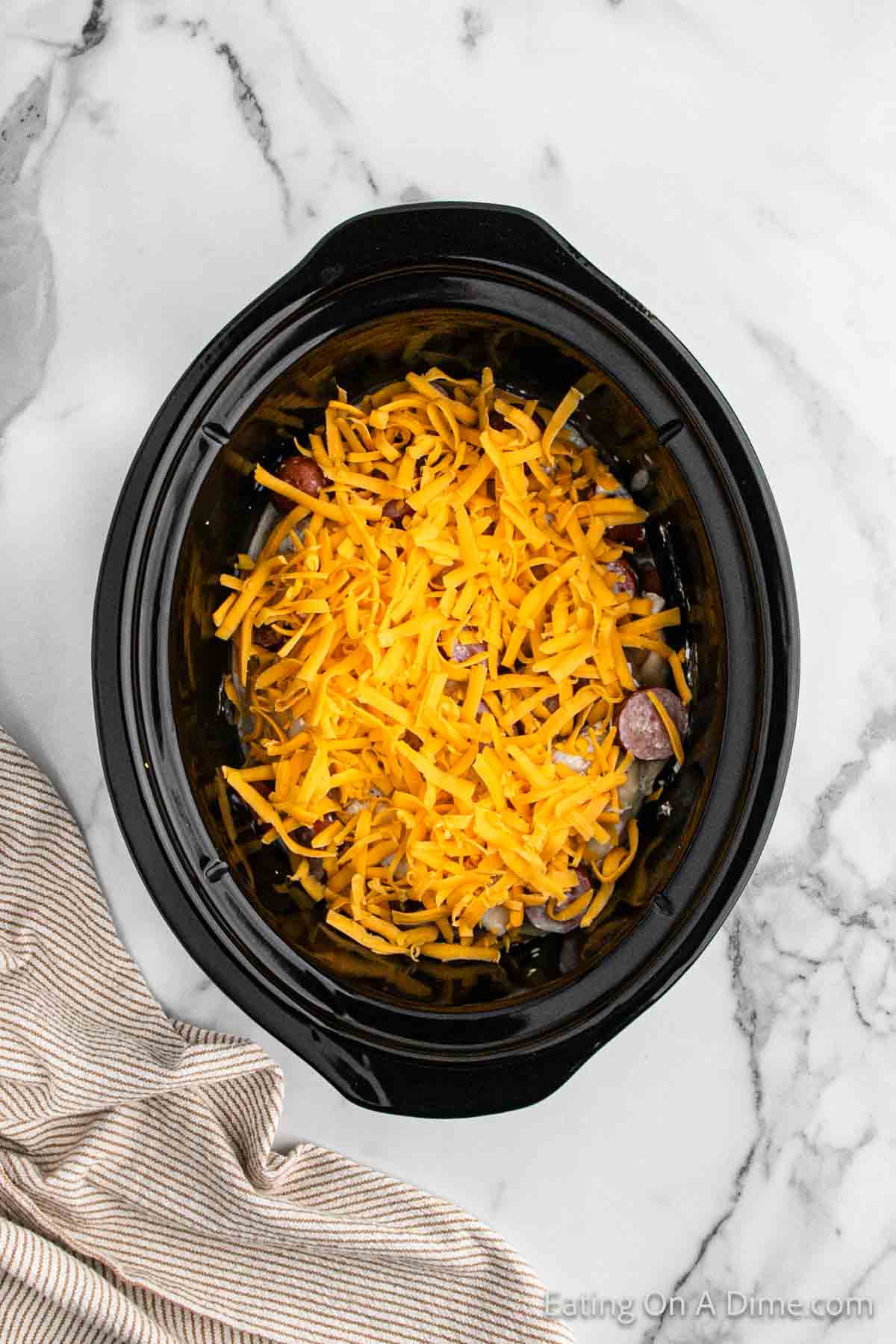 Top with shredded cheese