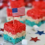 4th of July Rice Krispie Treats topped with an American flag.