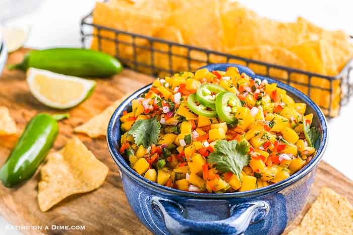 This easy Mango salsa recipe has the perfect combination of sweet and spicy. Enjoy mango salsa with your favorite Mexican dish, seafood or with tortilla chips. Fresh is best and you will love this mango salsa. #eatingonadime #mangosalsarecipe