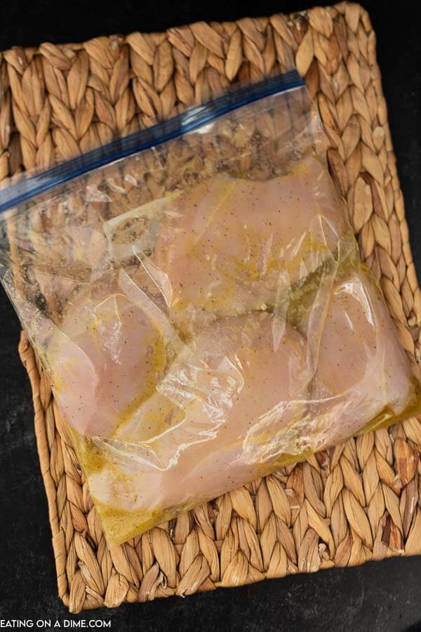 Chicken breasts and all the marinade ingredients in a sealed storage bag. 
