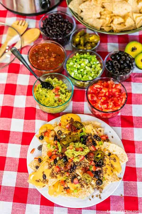 We love to fix a nacho bar for parties, game day and more. It is easy and always a hit. Everyone loves to customize their nachos and it's a fun meal idea.