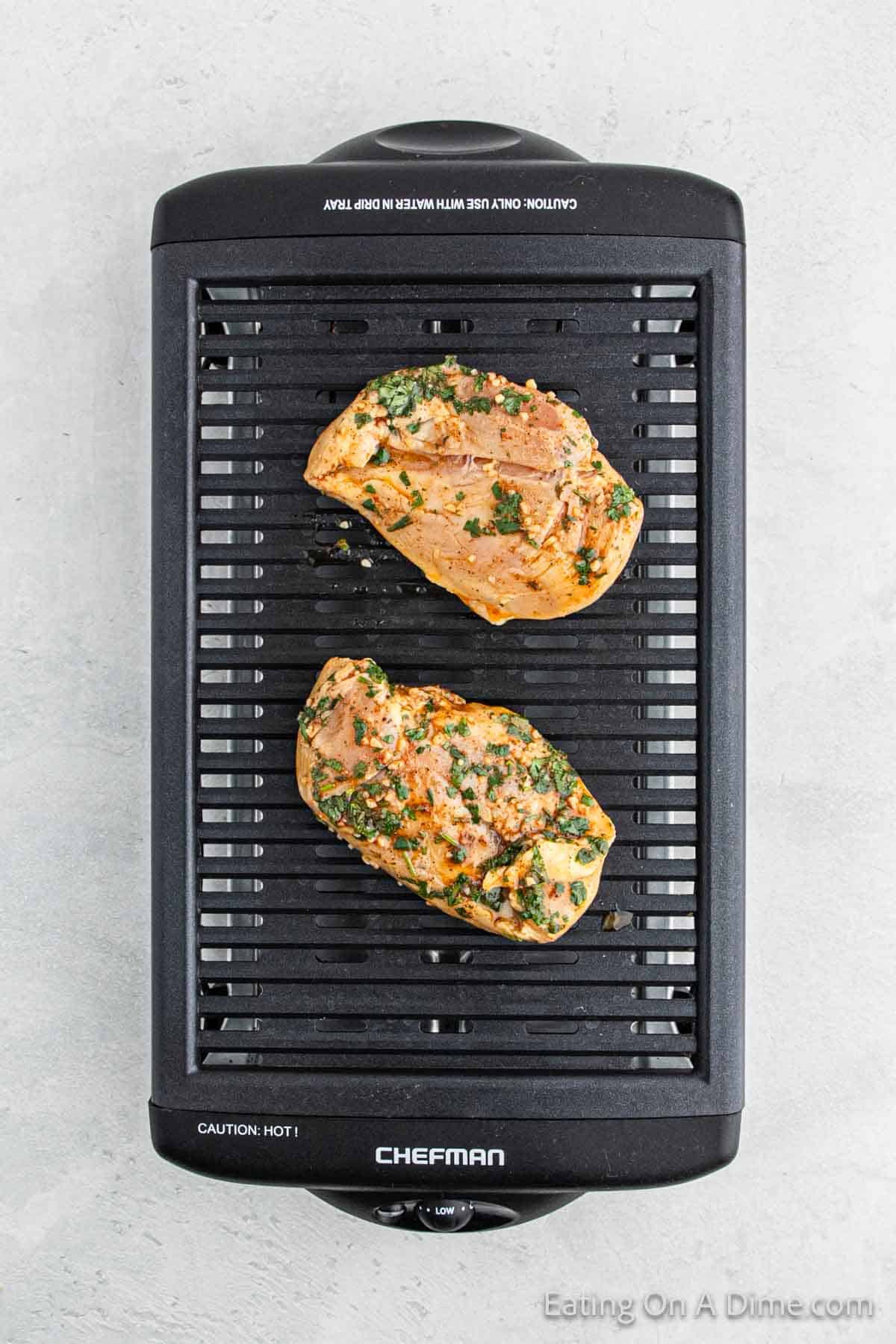 Cooking chicken on an indoor grill