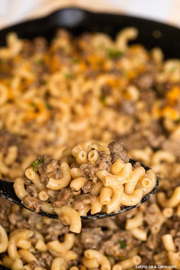 Cheeseburger hamburger helper is so easy to fix and better than anything you can buy in the store. Skip those box mixes and make this Cheeseburger hamburger helper homemade recipe. Lots of delicious beef in this hamburger helper homemade easy one pot meal make it so tasty. Your family will love this Cheeseburger hamburger helper homemade easy meal. Make this homemade easy hamburger helper today. #eatingonadime #homemadehamburgerhelper