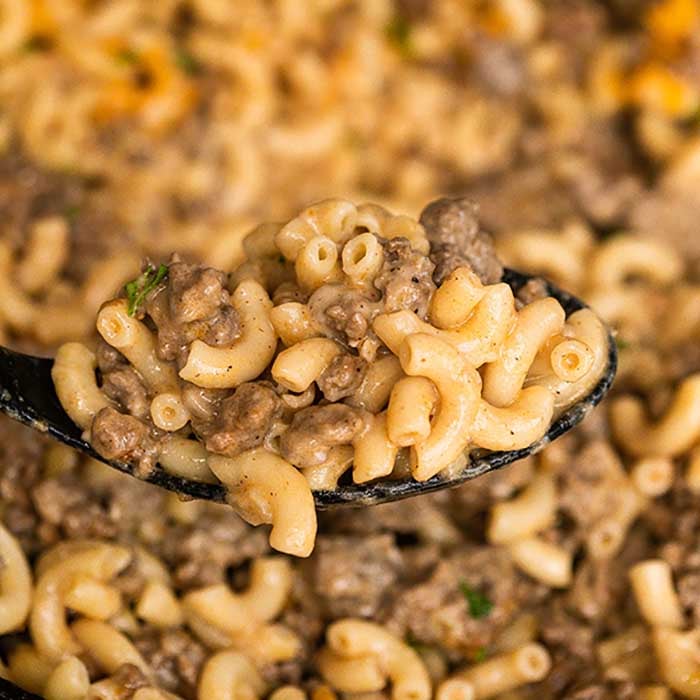 Cheeseburger hamburger helper is so easy to fix and better than anything you can buy in the store. Skip those box mixes and make this Cheeseburger hamburger helper homemade recipe. Lots of delicious beef in this hamburger helper homemade easy one pot meal make it so tasty. Your family will love this Cheeseburger hamburger helper homemade easy meal. Make this homemade easy hamburger helper today. #eatingonadime #homemadehamburgerhelper