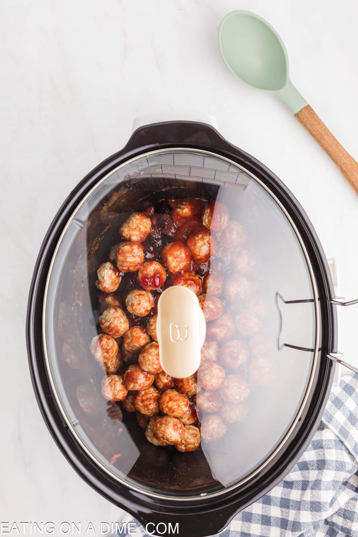 Cooking the meatballs in the slow cooker
