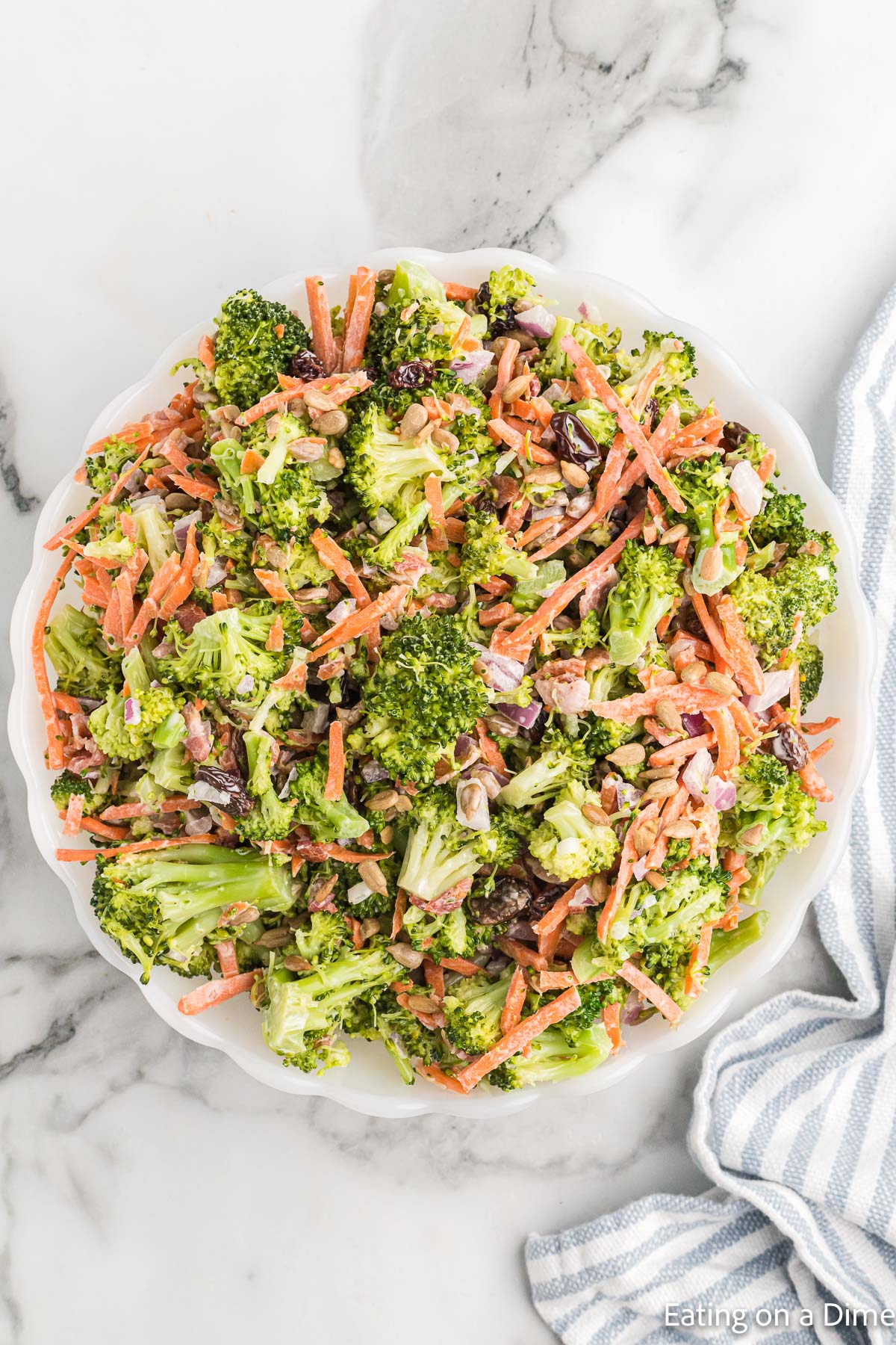 Broccoli salad in a white bowl