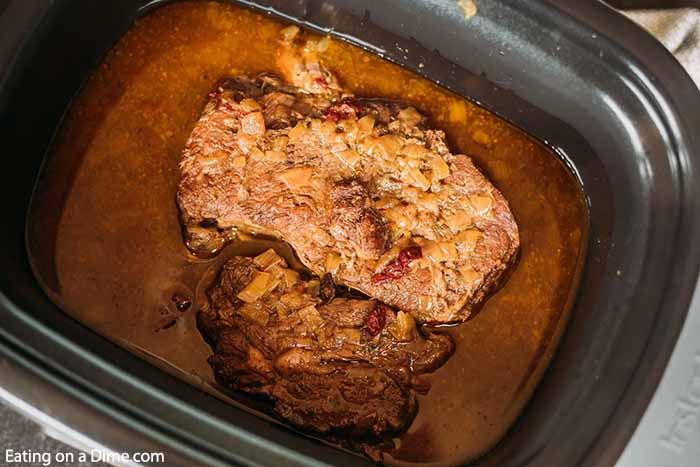 Close up image of Barbacoa Beef in the crock pot. 