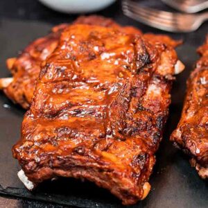 BBQ Ribs stacked on a platter